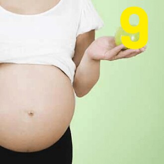9 : Femme enceinte mangeant équilibré