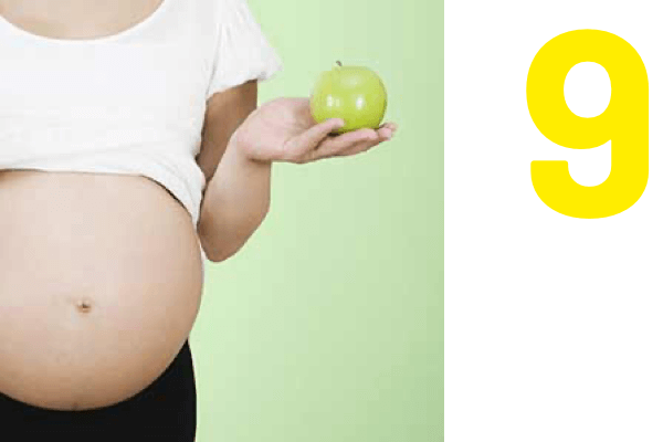 9 : Femme enceinte mangeant équilibré